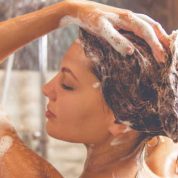 When should you shower after tanning?
